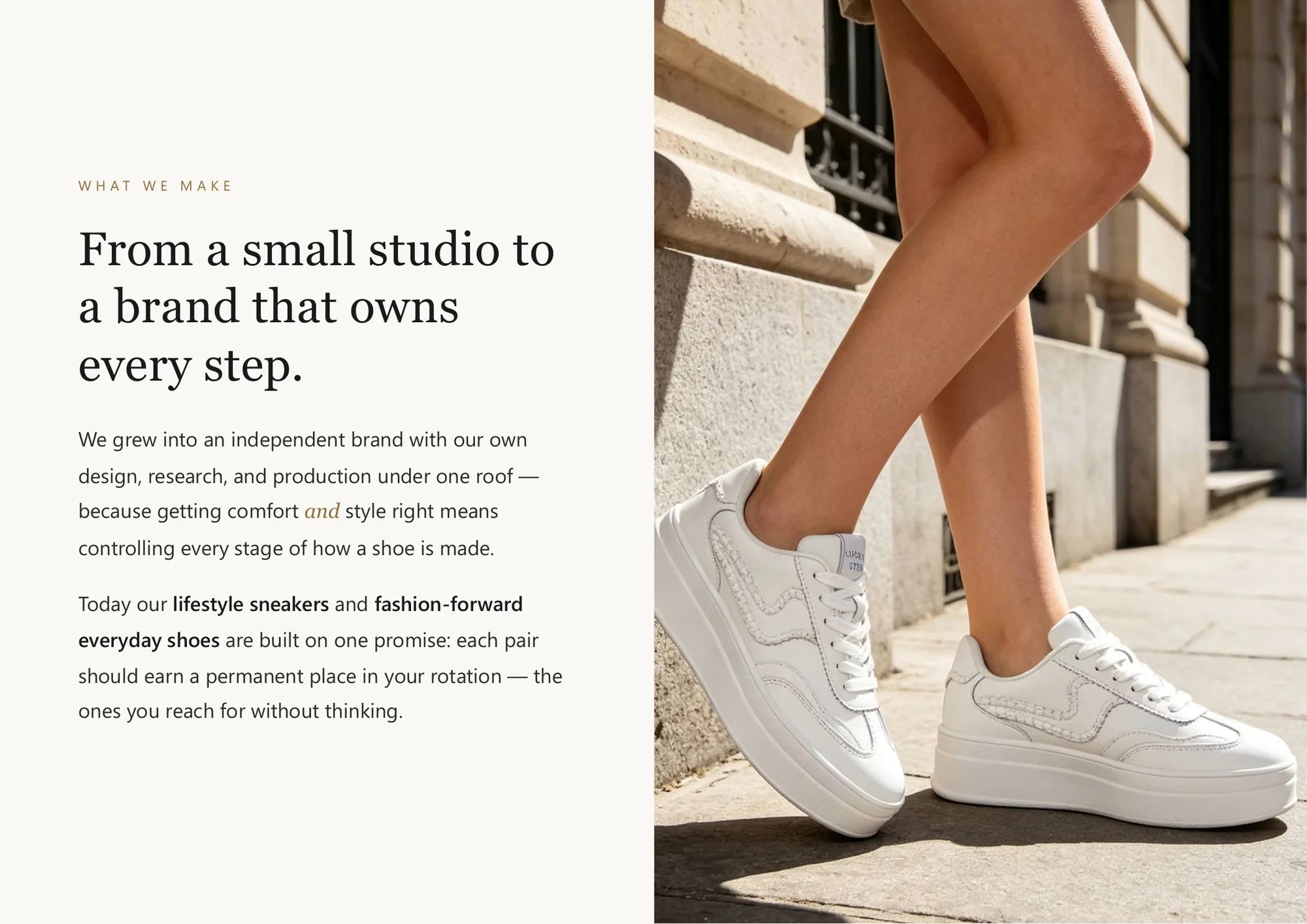 Lucky Step white platform sneakers worn outdoors in a city lifestyle setting.
